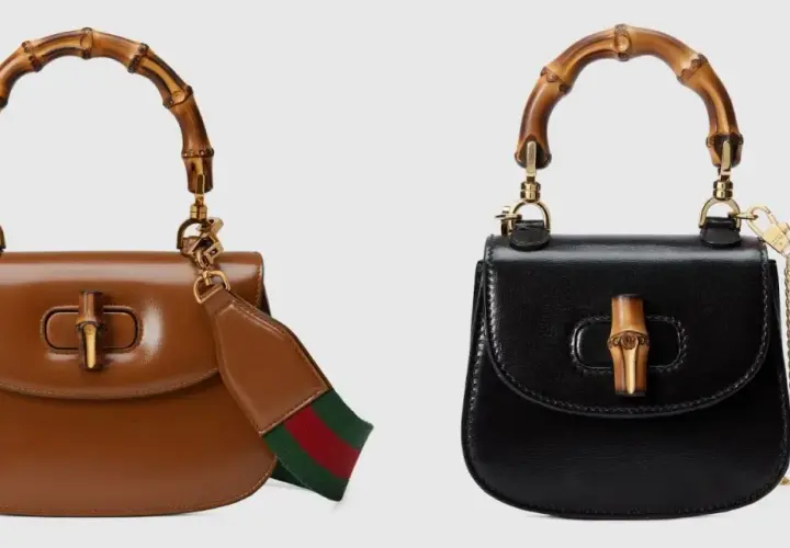 Dwie torebki Gucci z bambusowym uchwytem, symbolizujące bogatą historię rodziny Gucci. Brązowa z paskiem w paski, czarna z łańcuszkiem.
