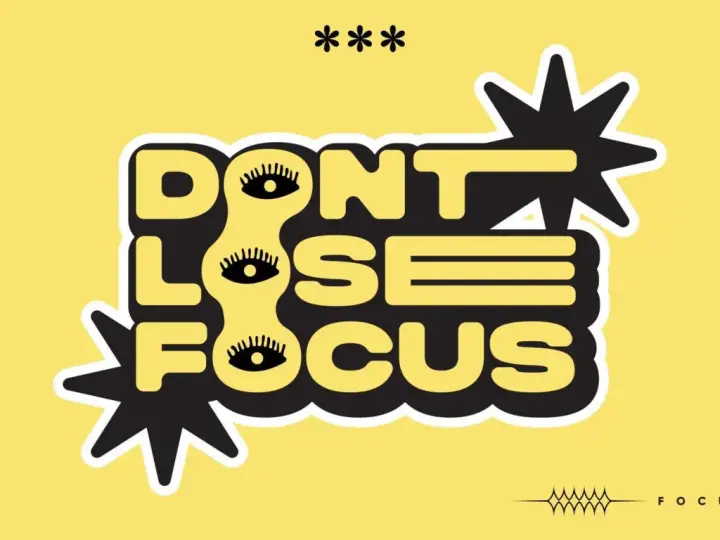 Napis "DON'T LOSE FOCUS" z oczami zamiast litery "O". Unikaj odbieganie od tematu, skup się na celu.