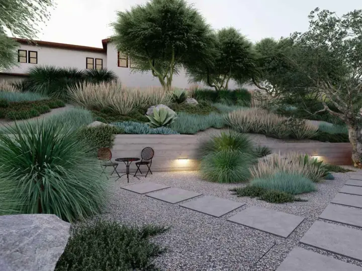 Giardino moderno con ghiaia, piante ornamentali e un piccolo tavolo. Idee giardino con ghiaia per un'oasi di pace.