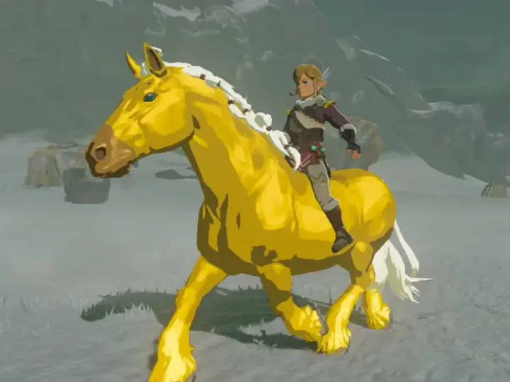 Link cabalga sobre el fiel caballo dorado de Zelda en un paisaje nevado.