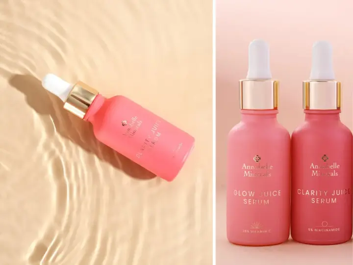 Różowe serum Annabelle Minerals z niacynamidem na trądzik. Dwa flakoniki z pipetką, jeden w wodzie, drugi obok.