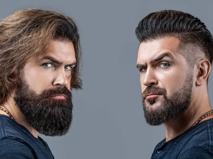 Dos hombres con barba. Uno con pelo largo y barba tupida, el otro con pelo corto y barba hipster corta.