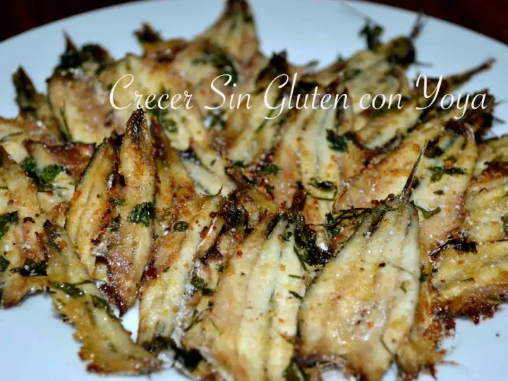 Deliciosos boquerones al horno, crujientes y dorados, con hierbas frescas y un toque de sal. ¡Una receta fácil y sabrosa!