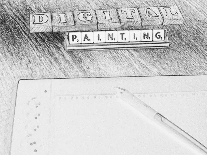 Drewniane klocki z literami układają się w napis "DIGITAL PAINTING". Obok leży pióro i notatnik, sugerując rozpoczęcie kursu.