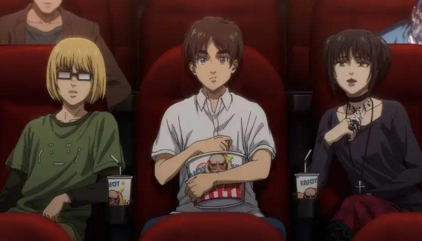 Eren, Armin i Mikasa oglądają "Attack on Titan po polsku" w kinie, zajadając się popcornem.