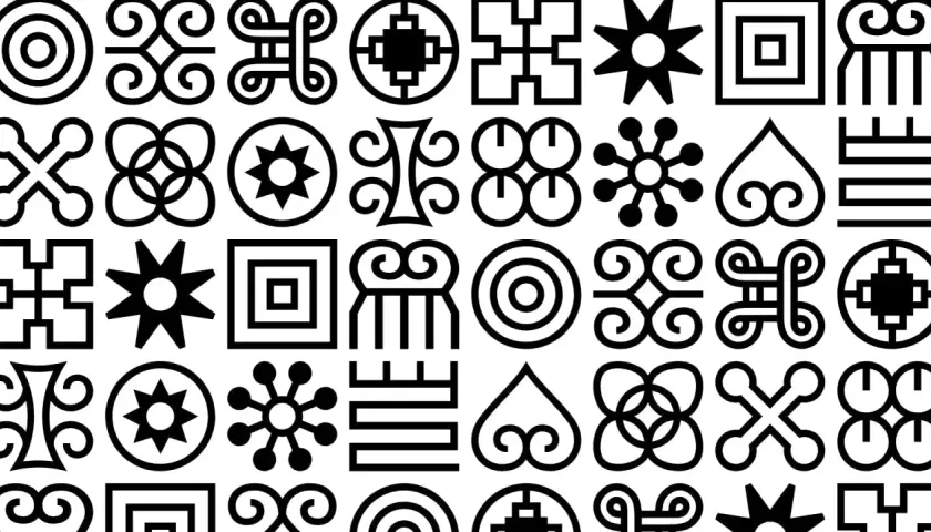 Collection de symboles géométriques noirs sur fond blanc, évoquant un riche motif africain.