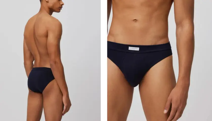 Hombre en perfil mostrando un slip azul marino. Primer plano del mismo slip, con etiqueta.