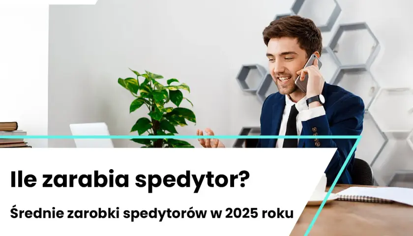 Uśmiechnięty mężczyzna w garniturze rozmawia przez telefon w nowoczesnym biurze.