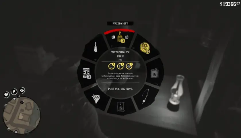 Red Dead Redemption poradnik: Koło przedmiotów z tonikiem wytrzymałości. Przywraca zdrowie i wzmacnia na chwilę.