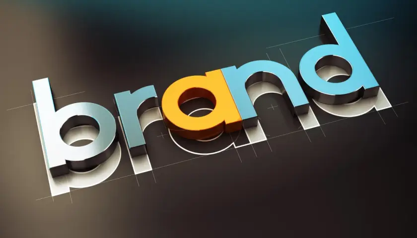Trójwymiarowe litery "brand" w różnych kolorach, tworzące unikalny styl ubierania się.
