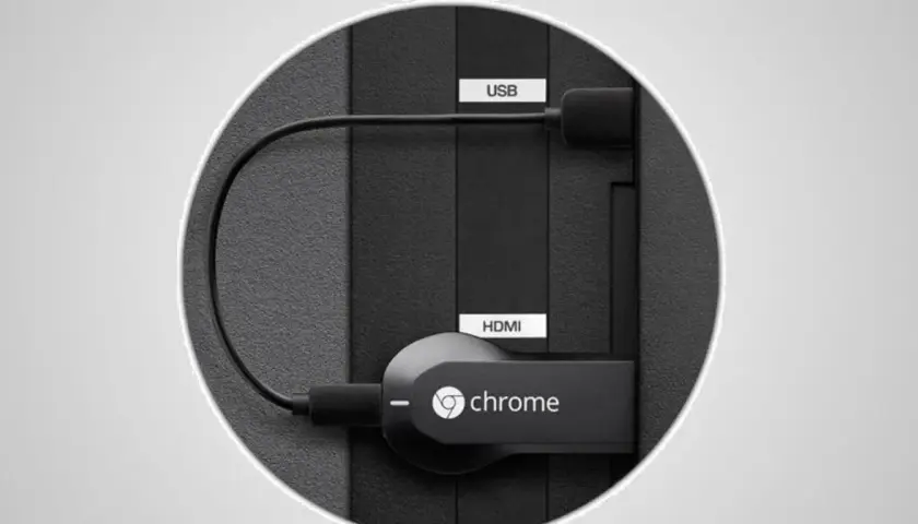 Chromecast podłączony do portu HDMI i USB telewizora Samsung.