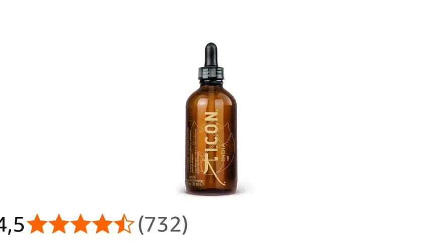 Frasco ámbar con gotero de ICON India Oil, un aceite exótico para el cabello.