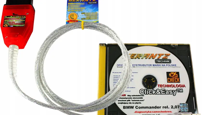 Czerwony adapter OBD z kablem USB i płytą CD z oprogramowaniem BMW Commander. Ten kabel k dcan jest kluczowy do diagnostyki samochodowej.