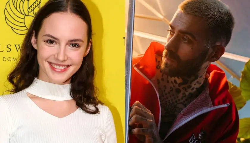 Martyna Byczkowska uśmiecha się na tle żółtej ściany, obok Quebo w czerwonej kurtce z tatuażami.