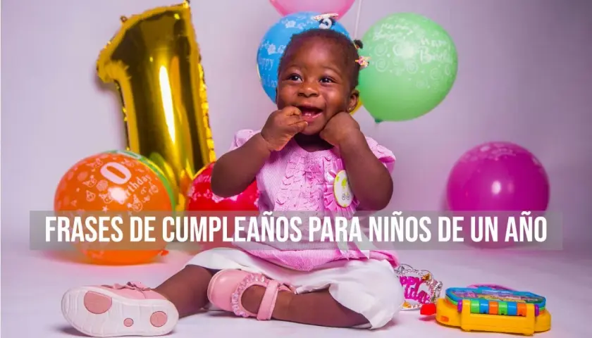 Niña sonriente celebra su primer año con globos y un gran número 1. ¡Felicidades 1 año niña!