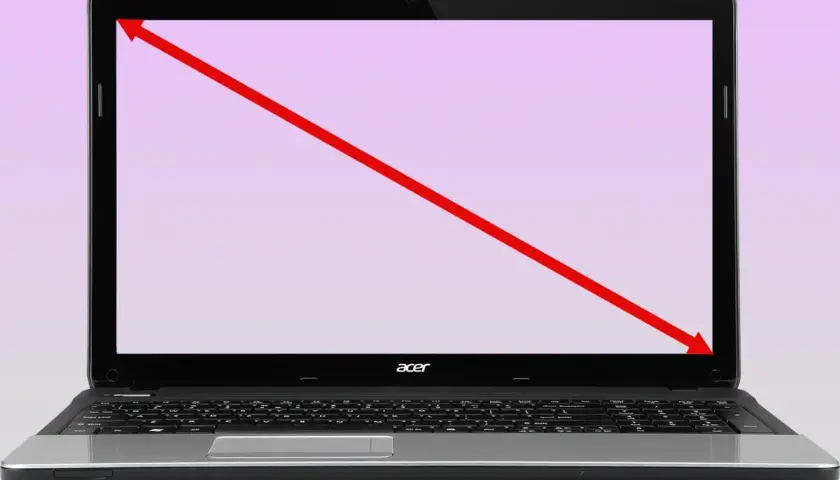 Czerwona linia pokazuje, jak sprawdzić ile cali ma laptop, mierząc po przekątnej ekranu.