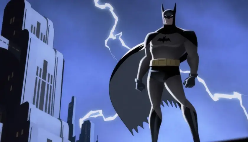 Batman, mroczny mściciel, stoi na tle burzowego nieba i Gotham.