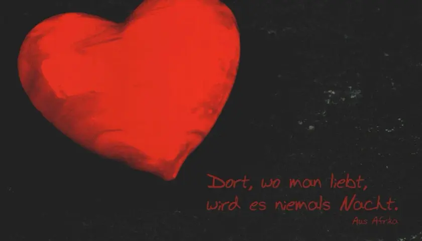 Ein leuchtend rotes Herz auf schwarzem Grund. "Dort, wo man liebt, wird es niemals Nacht." Ein Zitat, das zeigt, du hast ein großes Herz.