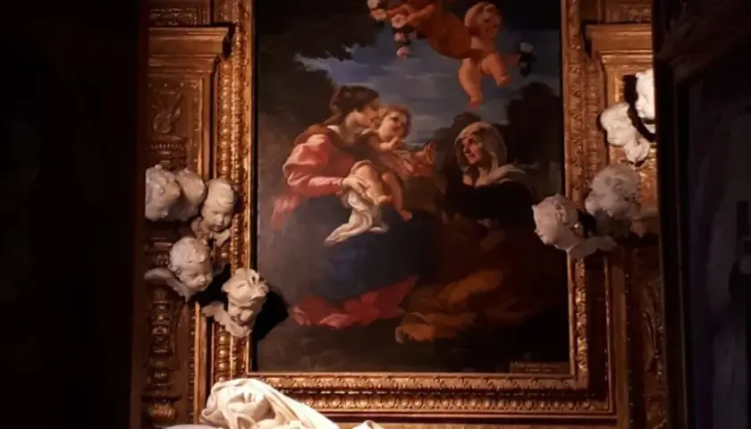 Dipinto con la Beata Albertoni, Maria e Gesù, circondati da putti e decorazioni barocche.