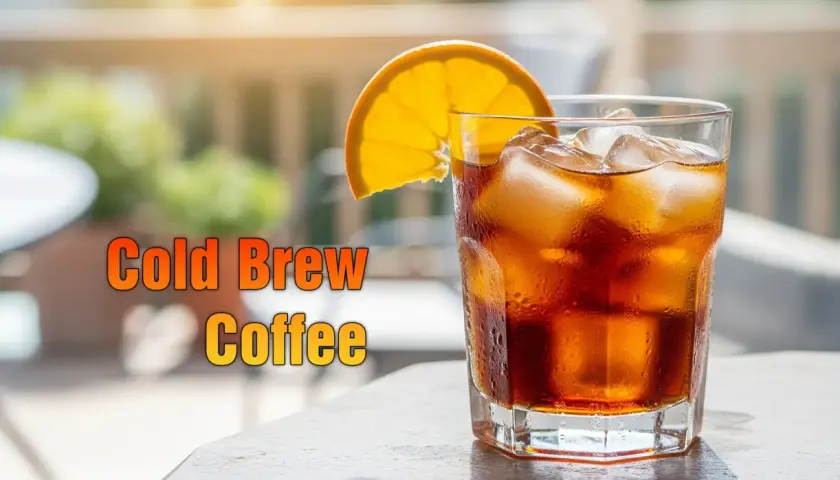 Orzeźwiający cold brew z pomarańczą i lodem. Idealne proporcje dla letniego orzeźwienia.