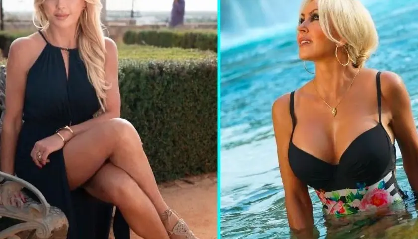 Teresa Werner w czarnej sukience i kostiumie kąpielowym w wodzie.