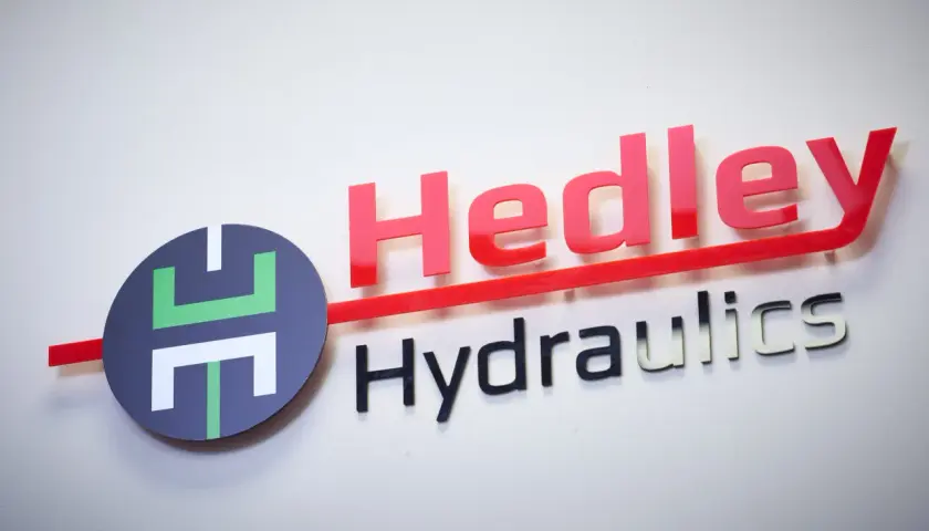 Hedley Hydraulics logo with red "Hedley" and silver "Hydraulics" text, and a circular emblem. This company is an empire in fluid power.