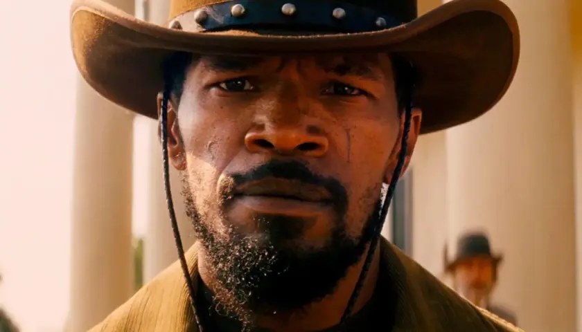 Jamie Foxx in Django Unchained, un volto che promette vendetta. Le recensioni del film lo celebrano.