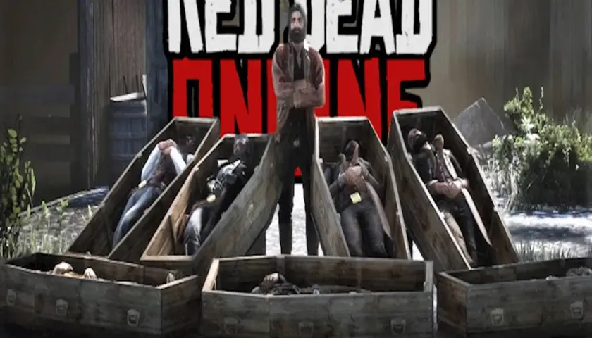 Mężczyzna w stroju z gry Red Dead Redemption stoi nad kilkoma trumnami z ciałami.