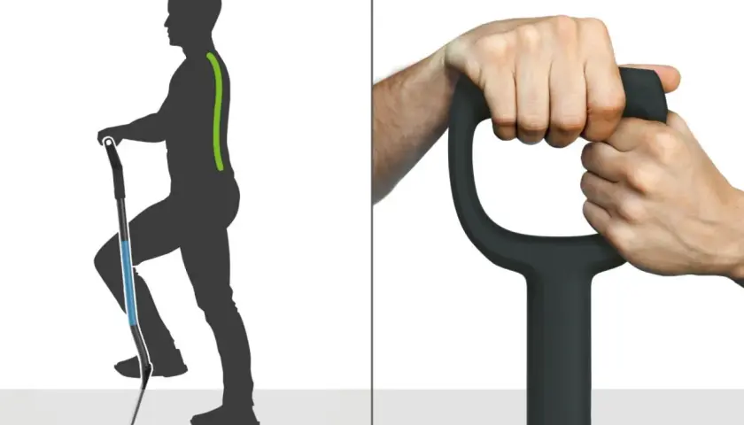 Ergonomiczna szufla z uchwytem, który zapewnia prawidłową postawę podczas pracy. Dwie dłonie pewnie chwytają rękojeść.