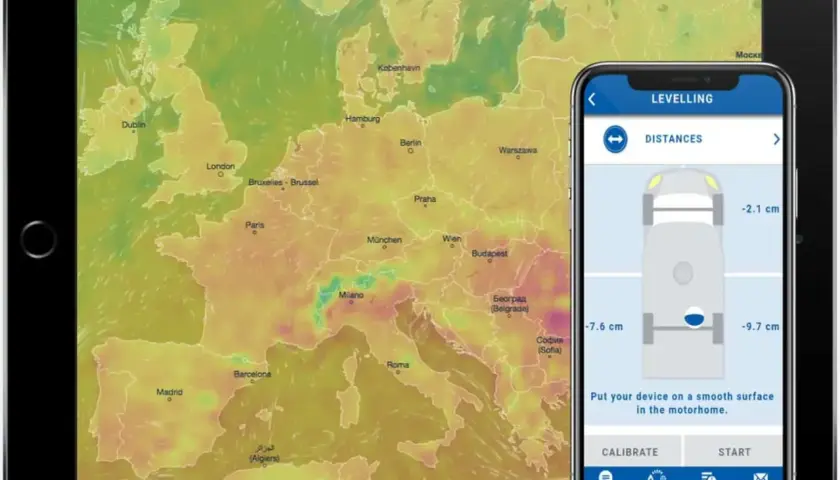 Aplikacja dla kamperów pokazuje poziomowanie pojazdu na ekranie smartfona, obok mapy Europy.