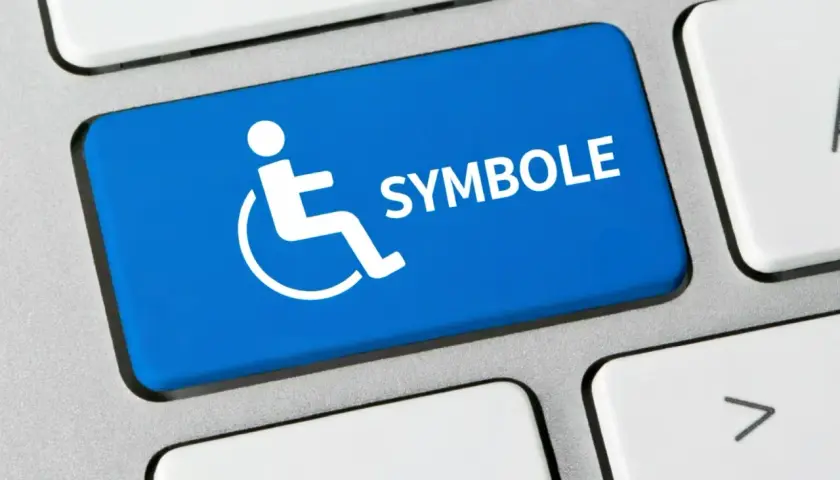 Niebieski klawisz z białym symbolem niepełnosprawności i napisem "SYMBOLE".