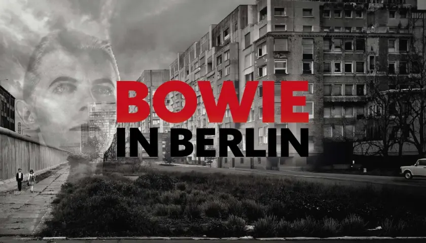 David Bowie i Berlin. Bilden visar en dubbelexponering med Bowies ansikte över en vy av Berlinmuren, byggnader och en bil.
