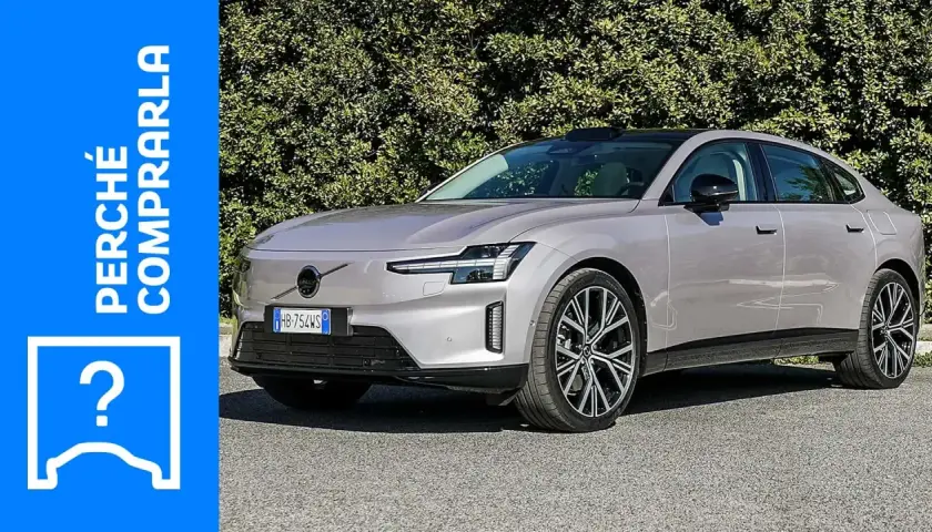 La Volvo ES90, un'auto elegante e moderna, si presenta in un elegante colore grigio metallizzato, con un'icona a forma di punto interrogativo che suggerisce una scelta.