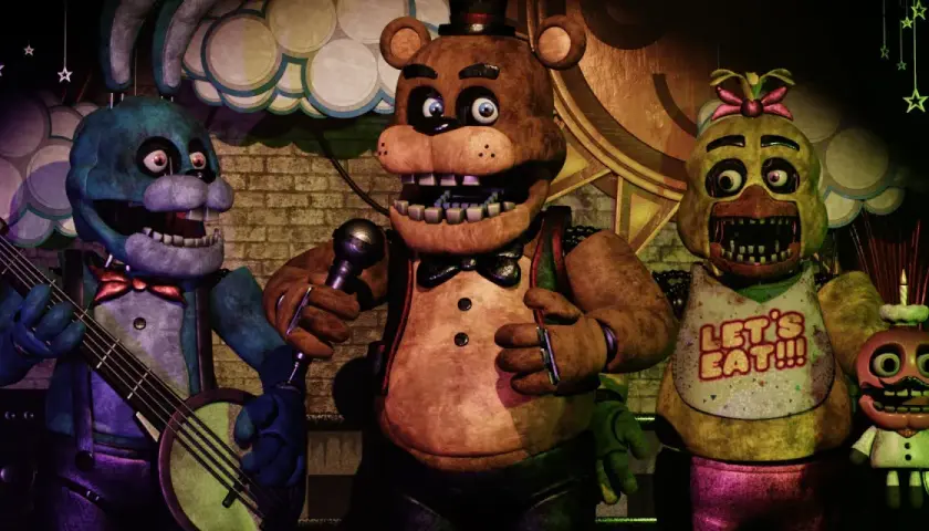 Freddy Fazbear, Bonnie i Chica z gry Five Nights at Freddy's (FNAF) na scenie. To właśnie co to jest FNAF – przerażająca gra o animatronikach.