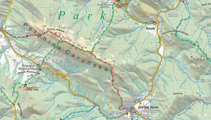 Mapa turystyczna Bieszczadów z zaznaczonymi szlakami, schroniskami i punktami widokowymi. Widoczna Połonina Caryńska i Ustrzyki Górne.