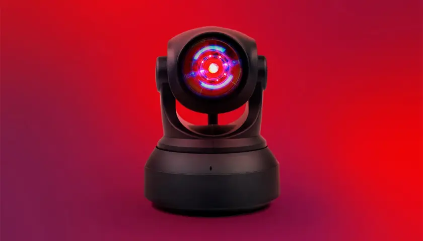Cámara de seguridad Wesco Anixter con lente rojo brillante, lista para vigilar.