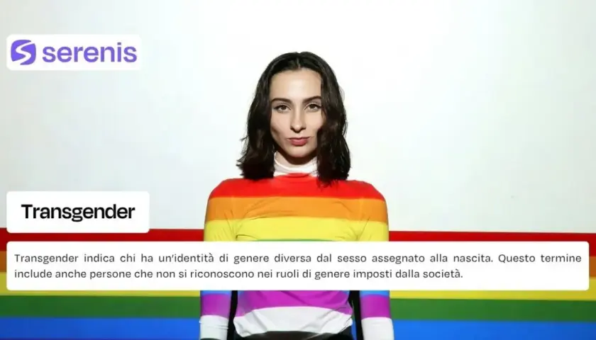 Ragazza con maglia arcobaleno, simbolo di transizione di genere e inclusione.