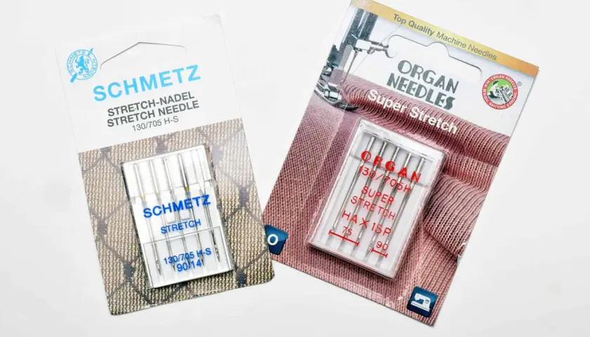 Two packages of sewing machine needles for knits: Schmetz Stretch and Organ Super Stretch.