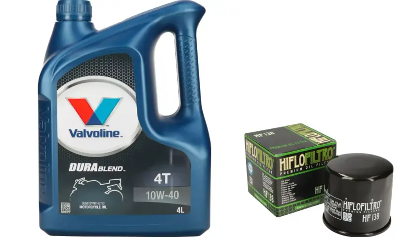 Niebieska butelka oleju silnikowego Valvoline DuraBlend 4T 10W-40 i filtr oleju Hiflofiltro HF 138.