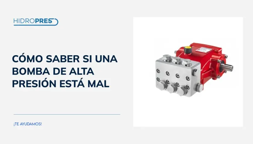 Bomba de alta presión roja y plateada, esencial para hidrolimpiadoras. Aprende a detectar fallos.