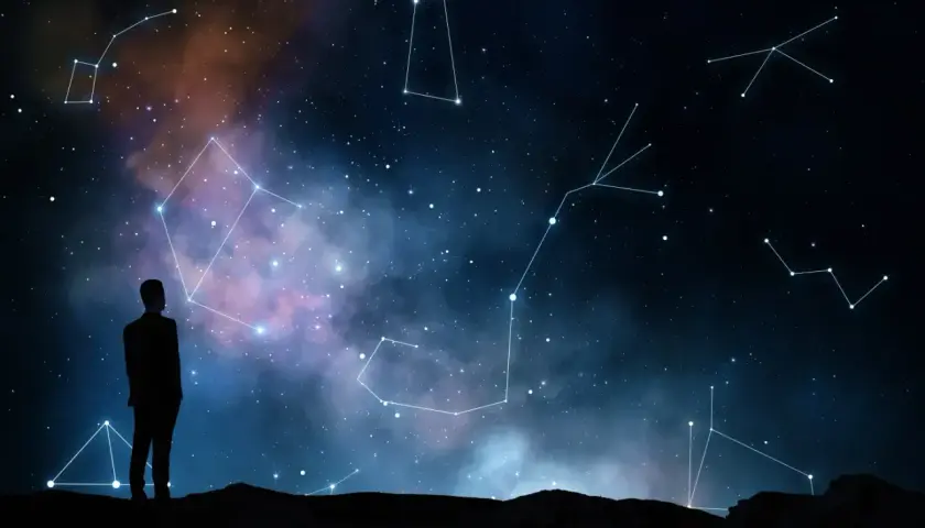 Człowiek wpatruje się w nocne niebo pełne gwiazd i konstelacji, szukając odpowiedzi, czy wśród nich kryje się najgorszy znak zodiaku.
