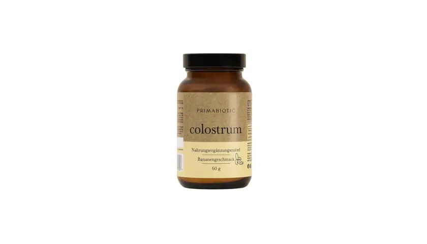 Braunes Glas mit Primabiotic Colostrum, Nahrungsergänzungsmittel mit Bananengeschmack, 60g.