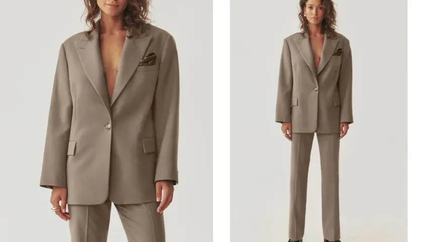 Eleganckie stylizacje z marynarką oversize. Modelka prezentuje beżowy garnitur z luźną marynarką i dopasowanymi spodniami.