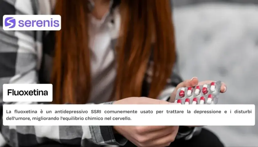 Donna tiene blister di capsule rosse e bianche. La fluoxetina, nome commerciale di un antidepressivo, aiuta a trattare depressione e disturbi dell'umore.