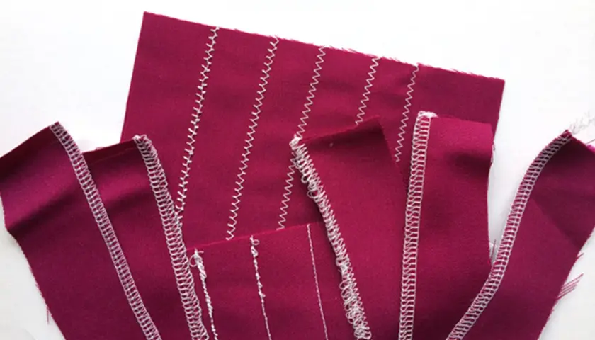 Swatches of magenta fabric show various stitch types, demonstrating adjusting tension on a sewing machine for different seam finishes.