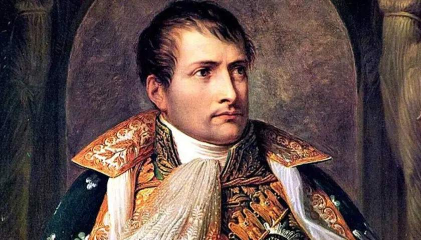 Portret Napoleona Bonaparte w bogatym stroju. Czy wiesz, że miał on niezwykłą pamięć do twarzy? Oto ciekawostki o Napoleonie Bonaparte.
