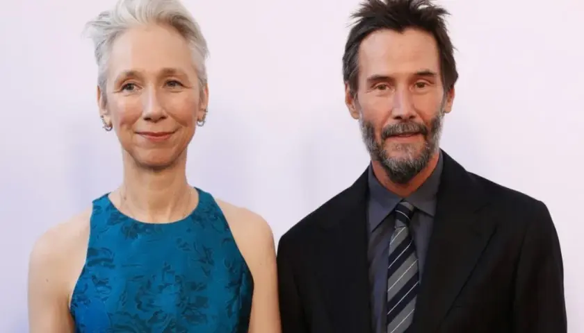 Keanu Reeves z żoną Alexandrą Grant na czerwonym dywanie.