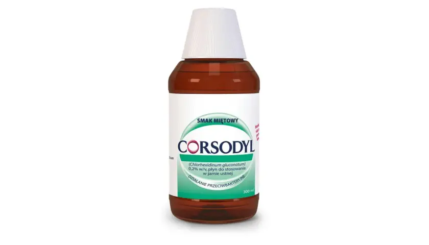 Płyn Corsodyl o smaku miętowym, 0,2% chlorheksydyny. Pomaga w gojeniu dziąseł po wyrwaniu zęba, działa przeciwbakteryjnie.