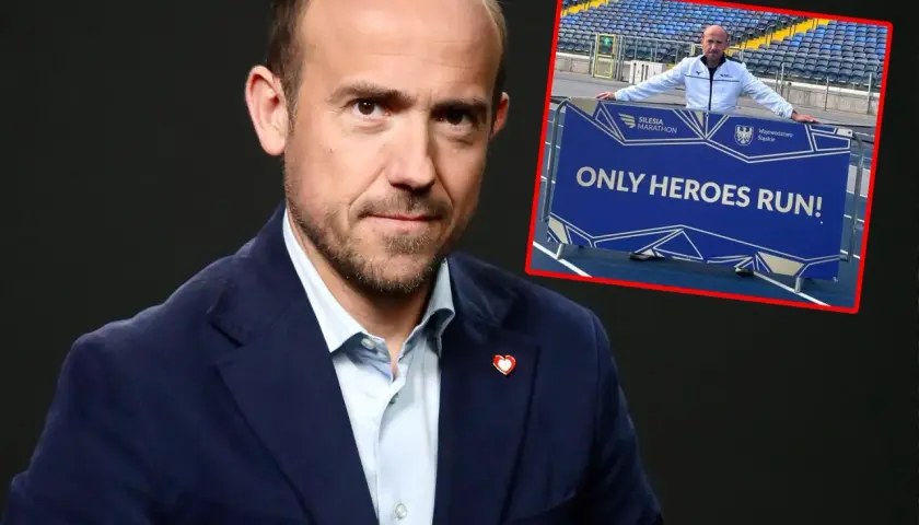 Borys Budka na tle stadionu, z napisem "Only Heroes Run!". Czy wróci do pierwszej linii polityki KO w drugiej połowie 2026 roku?
