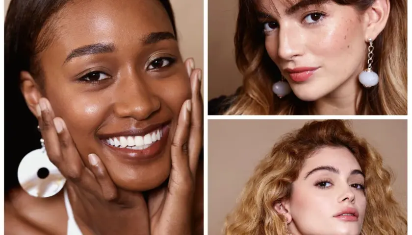 Tre donne sorridono, con focus sui loro volti. Perfetto per capire dove mettere la cipria per un finish impeccabile.